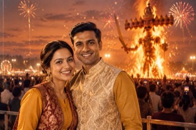 ChatGPT result: a couple at a Dussehra ground with a burning Ravan effigy and fireworks behind them